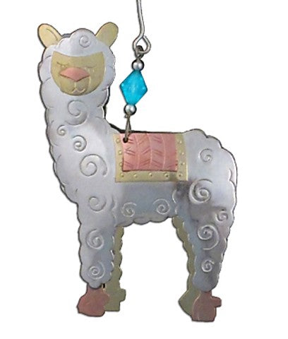 A silver-colored alpaca ornament with gold and copper details, hanging from a hook made of recycled ecofriendly metals
