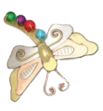 Colorful dragonfly-shaped art charm