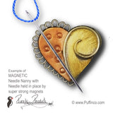 Puffin Magnetic Needle Nanny holding needle thread in place.JPG